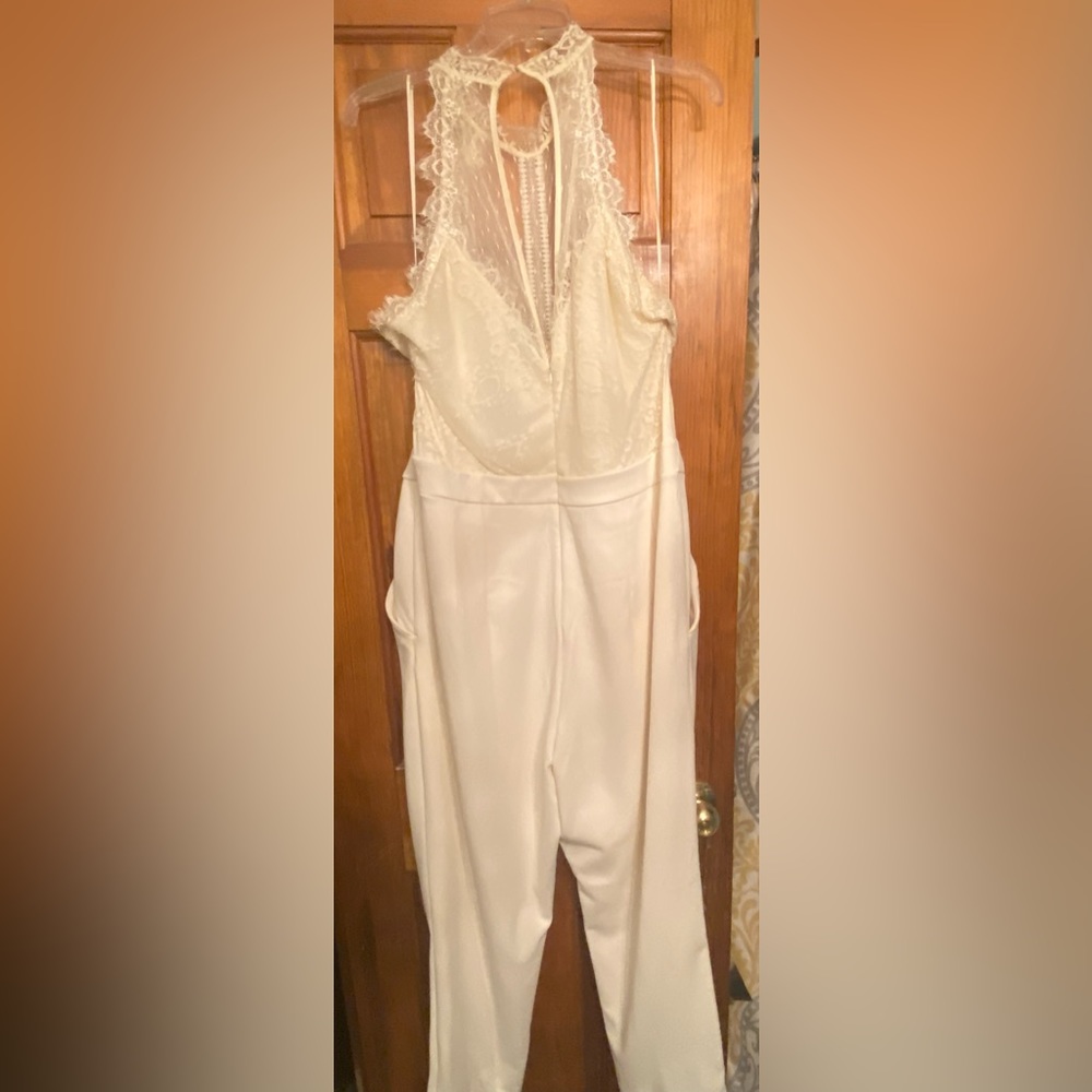 Stunning off white size 14 jumpsuit! Perfect destination wedding! Never worn.